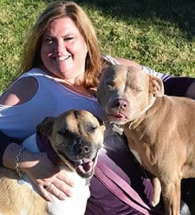 Jill with two happy dogs