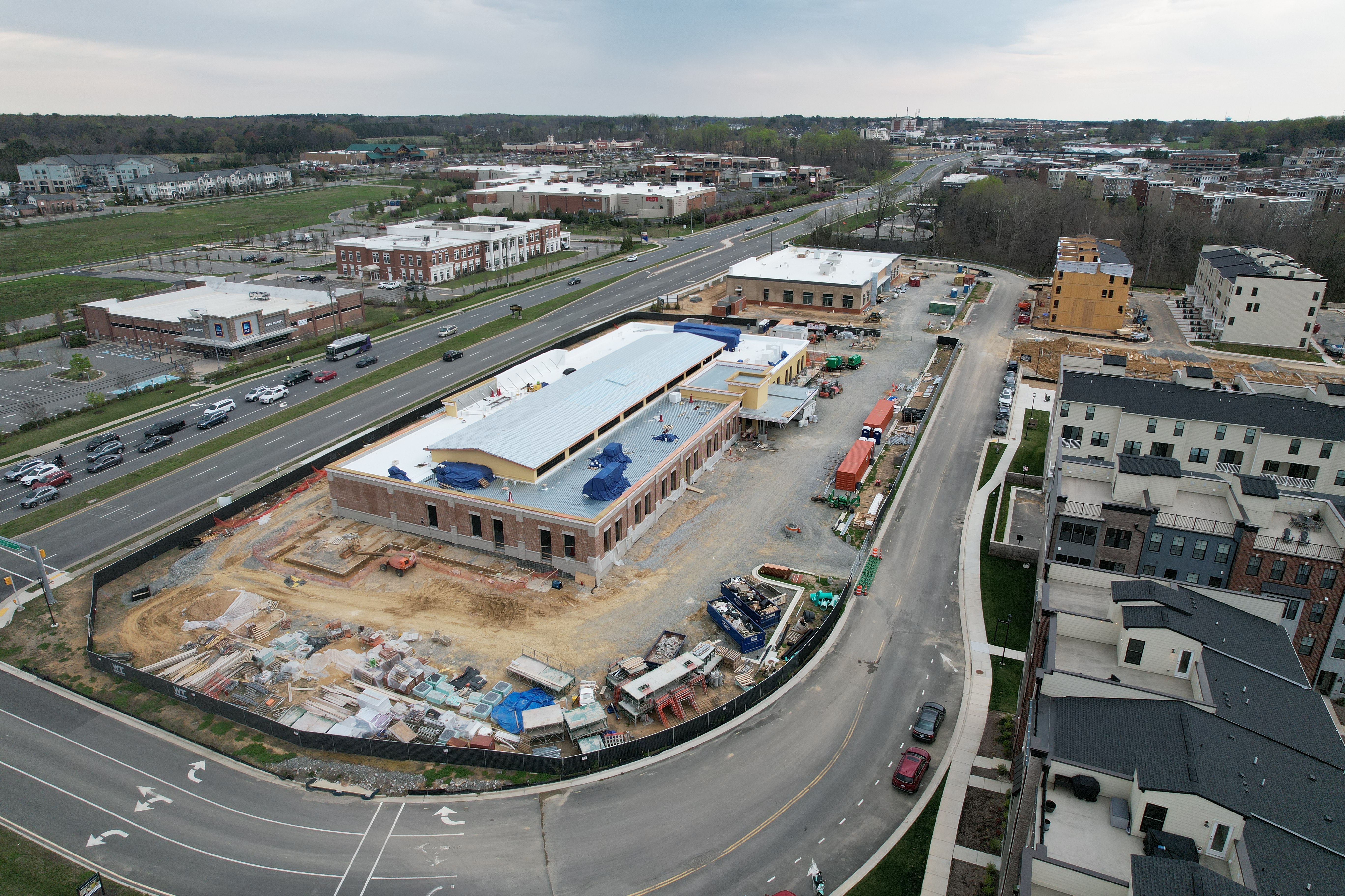 An aerial sideview shot of the foundation being constructed from the right side. 