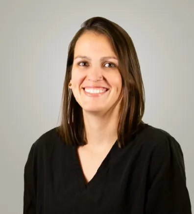 A photo of Dr. Holman smiling. A photo of Dr. Holman smiling.