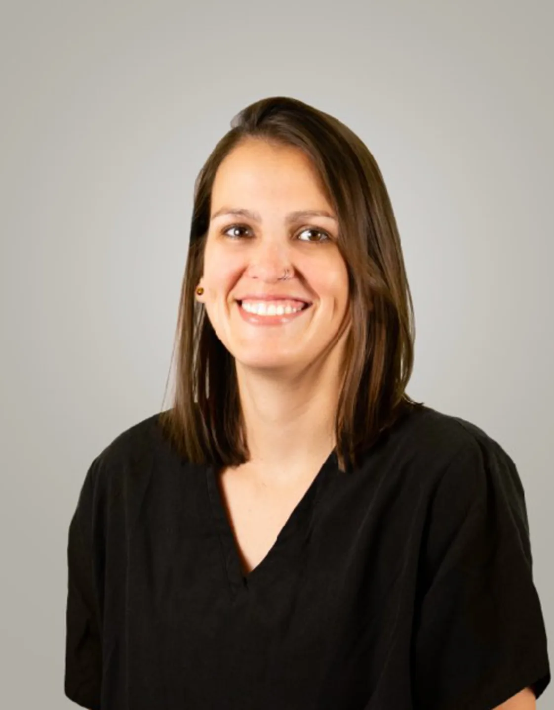 A photo of Dr. Holman smiling. A photo of Dr. Holman smiling.