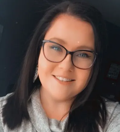 Alex smiling in front of the camera. Alex smiling in front of the camera.