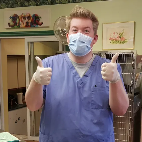 Vet assistant Mitch doing a thumbs up at Three Islands Veterinary Services