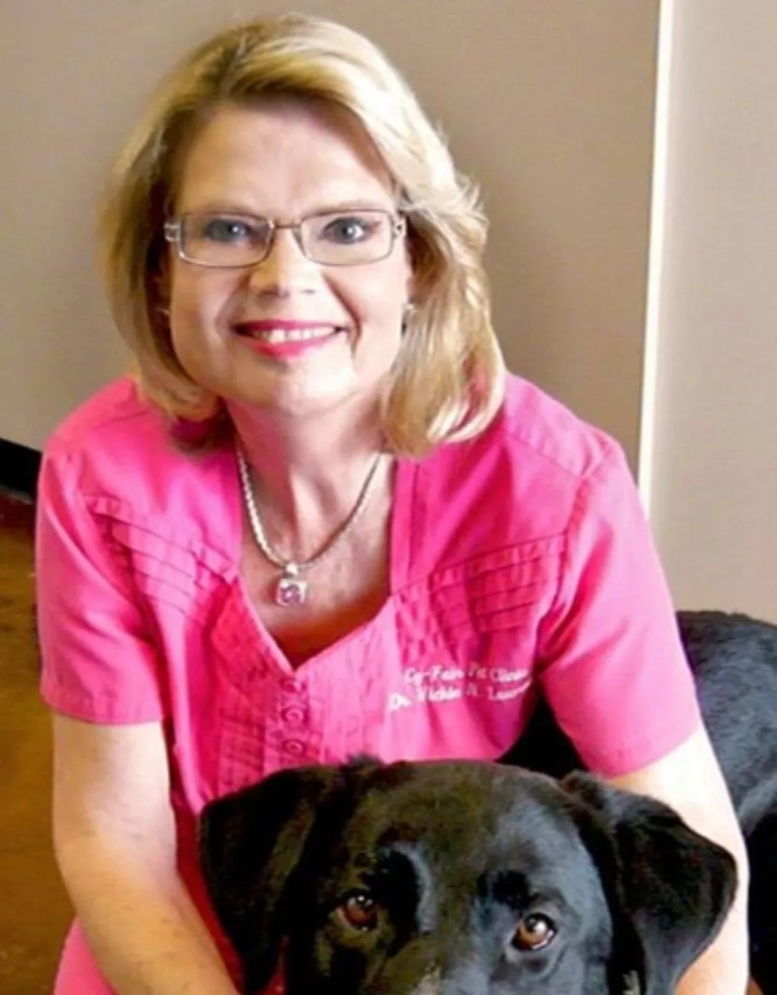 Portrait of Dr. Vickie Lawrence with dog Portrait of Dr. Vickie Lawrence with dog