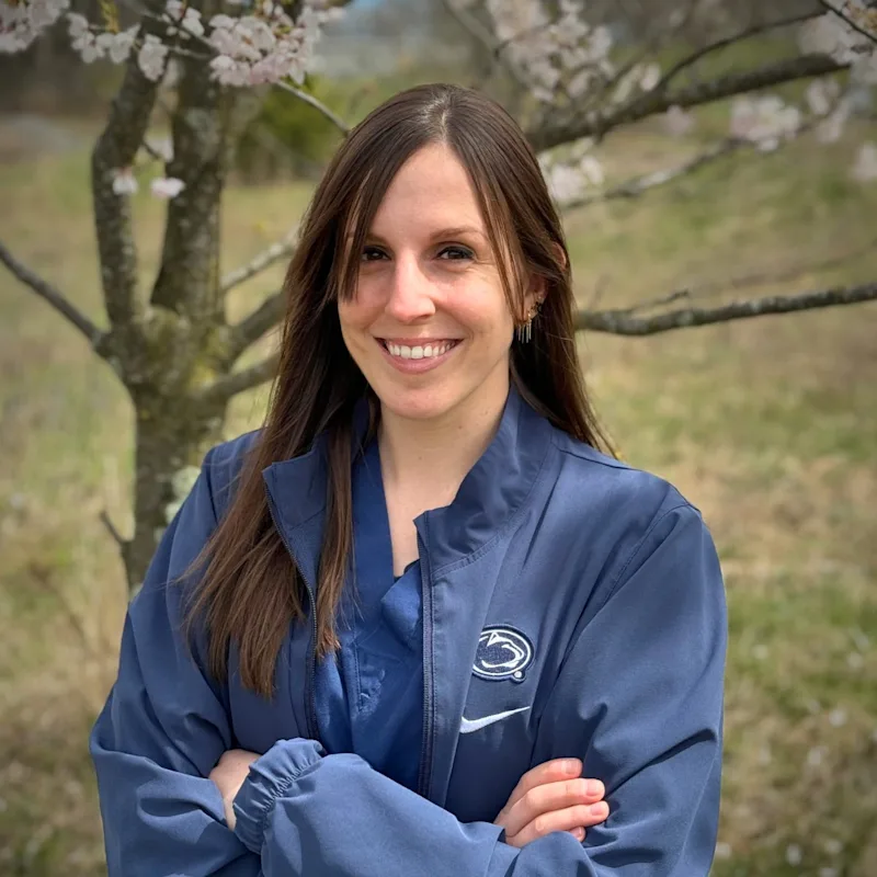 Photo of Dr Zalek and small brown animal Photo of Dr Zalek and small brown animal