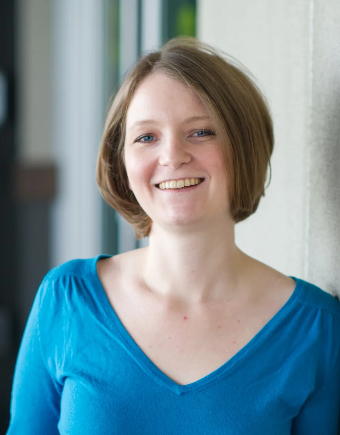 Sarah Trab in a blue blouse. Sarah Trab in a blue blouse.