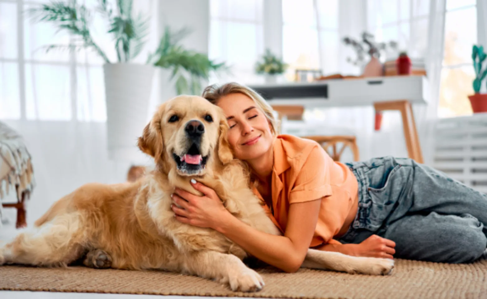 Girl Laying on the Floor Hugging Her Senior/Older Dog Girl Laying on the Floor Hugging Her Senior/Older Dog