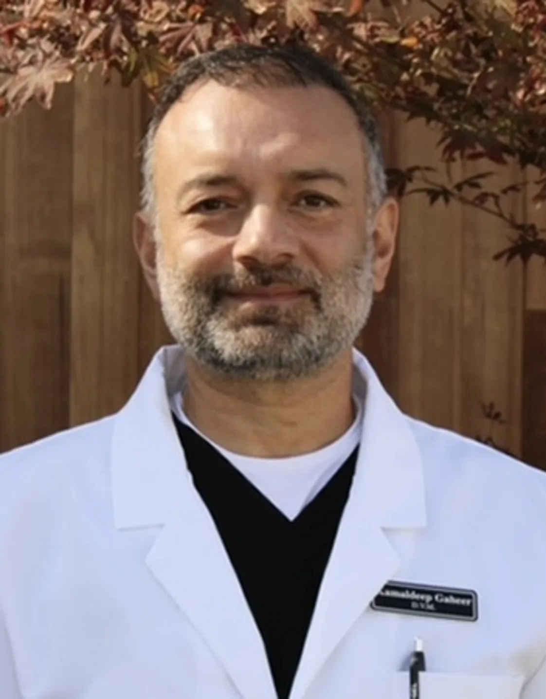 A picture of a man in a white lab coat A picture of a man in a white lab coat