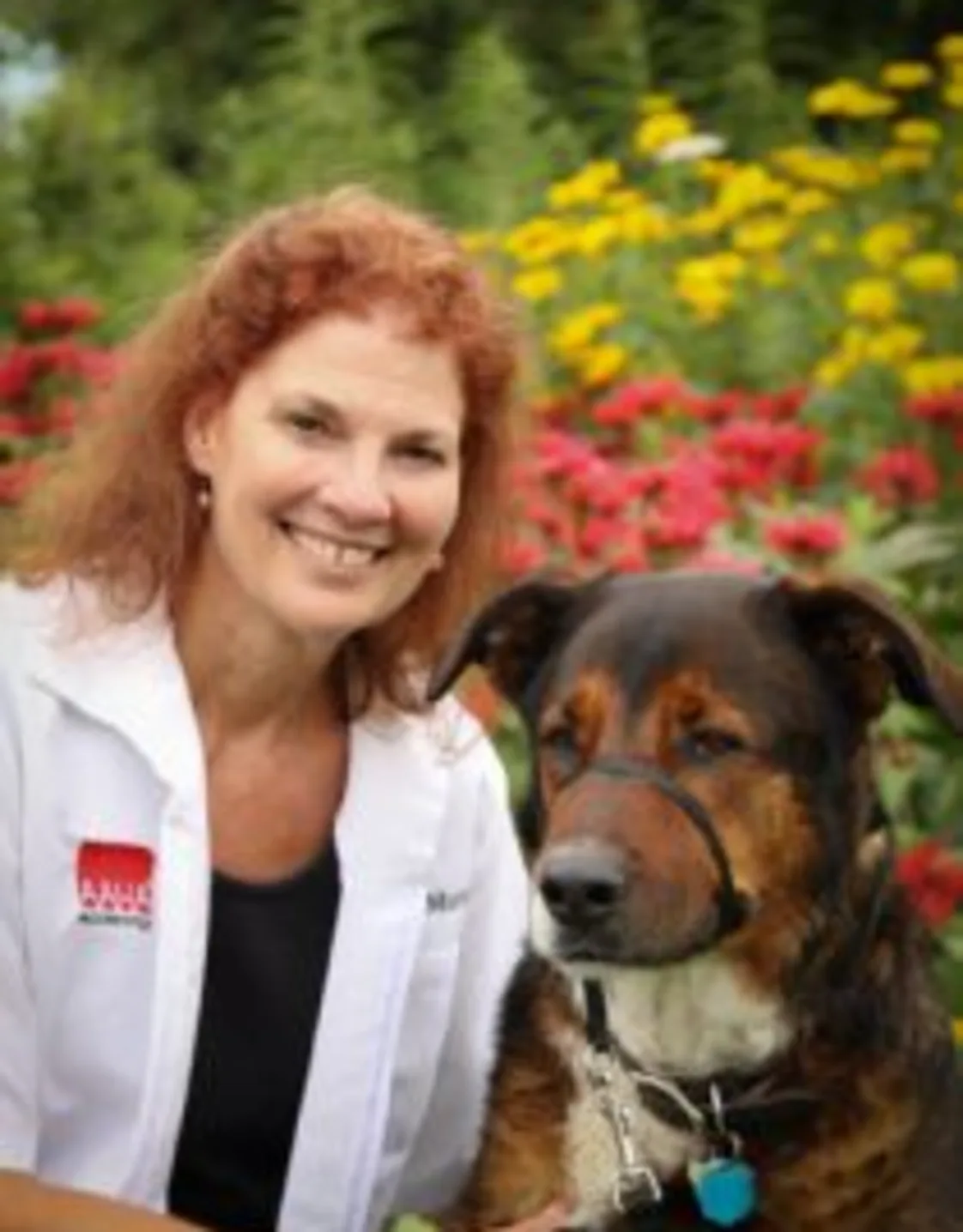 Linda I. Morris sitting next to dog Linda I. Morris sitting next to dog