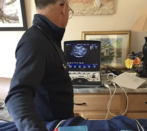 Staff Looking at Ultrasound Staff Looking at Ultrasound