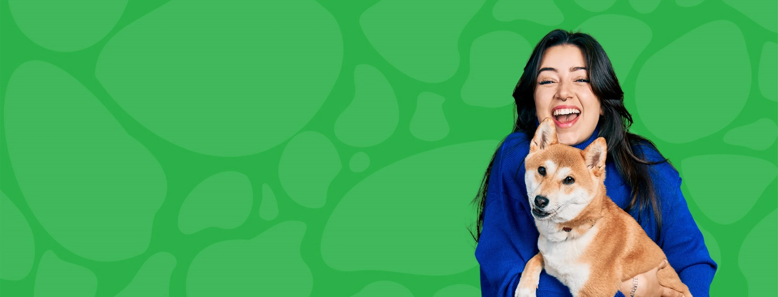 Dog and woman with green background