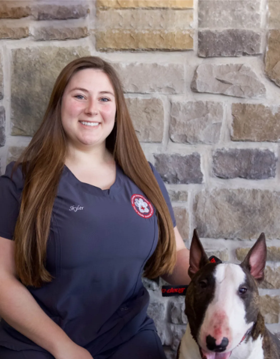 Skyler Brown with a dog named Weston Skyler Brown with a dog named Weston