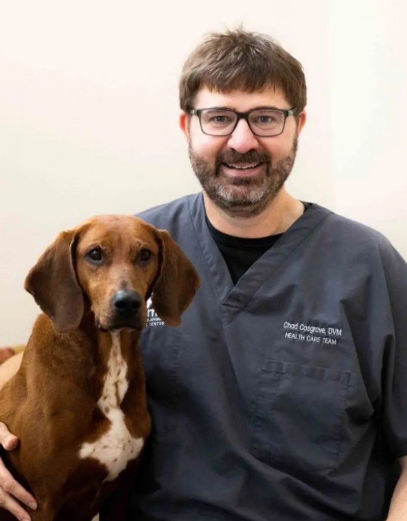 Dr. Chad Cosgrove with dog.