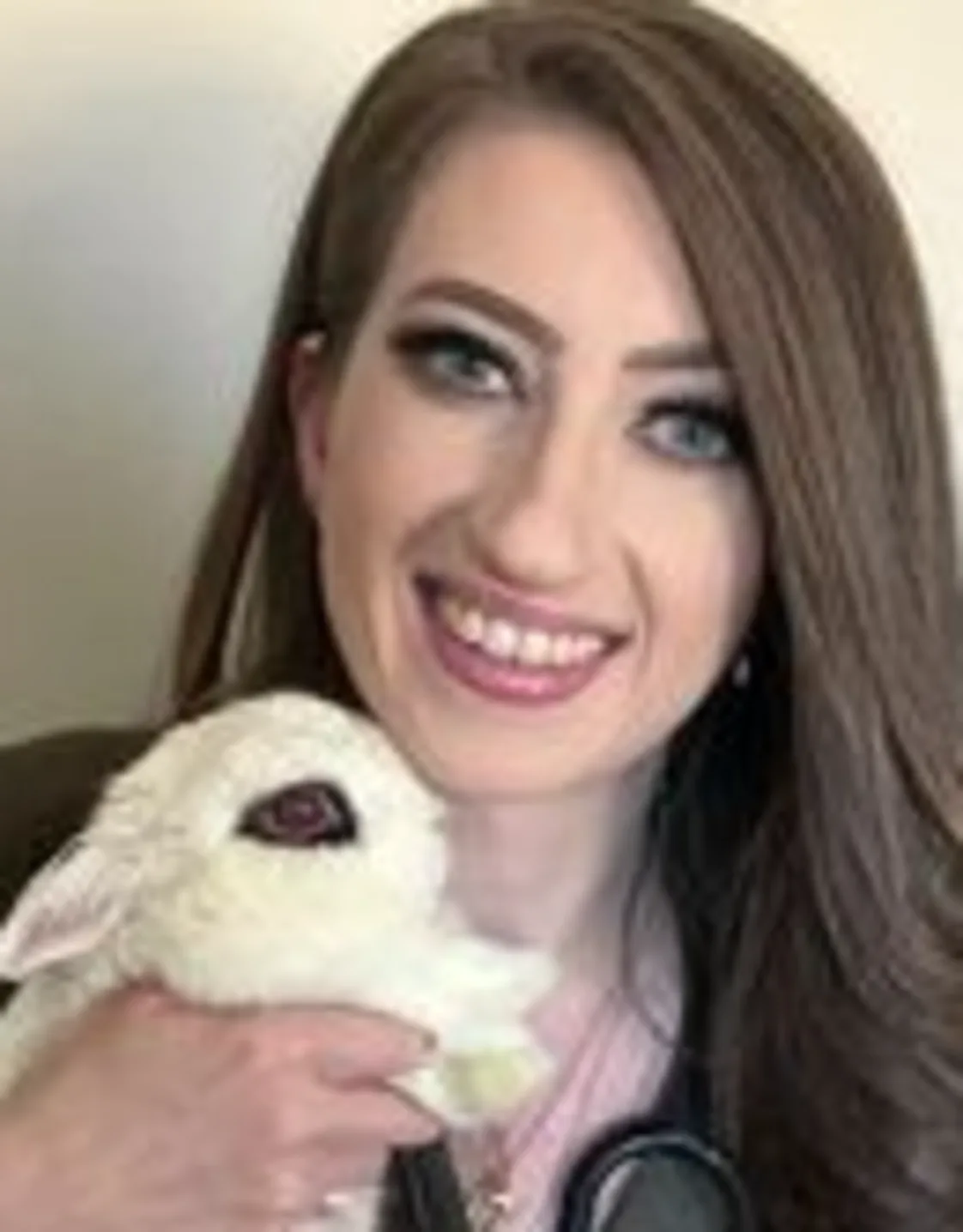 Meghan Armstrong holding a white bunny Meghan Armstrong holding a white bunny