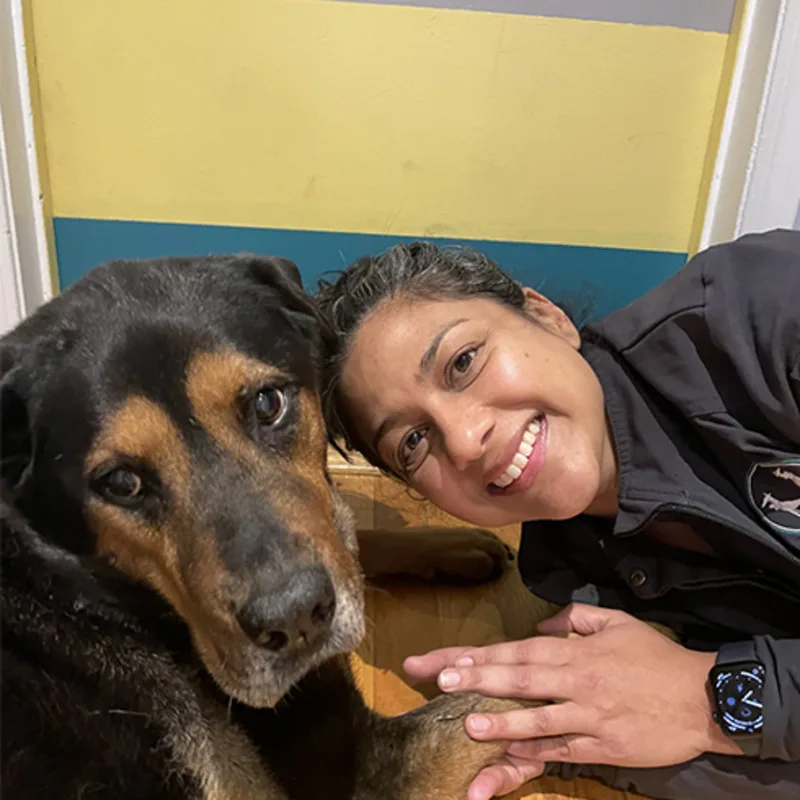 Dr. Pratikshya Patil with a dog, Carmen Dr. Pratikshya Patil with a dog, Carmen