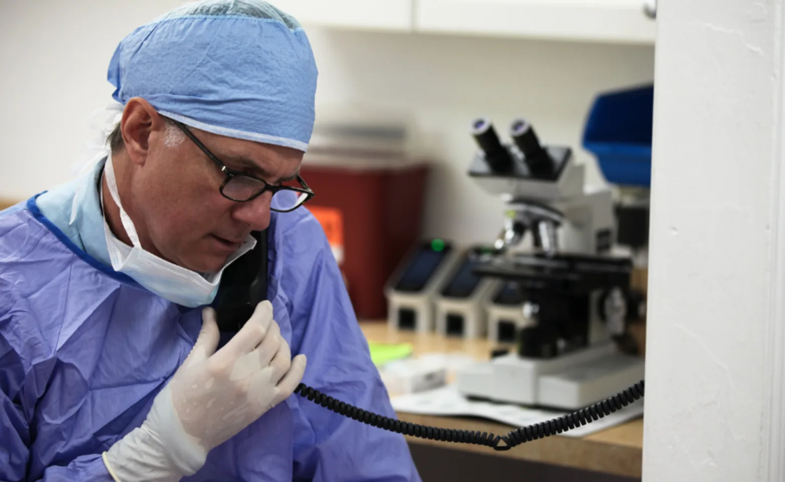 Veterinarian providing assistance over the phone at The Animalife Veterinary Center Veterinarian providing assistance over the phone at The Animalife Veterinary Center