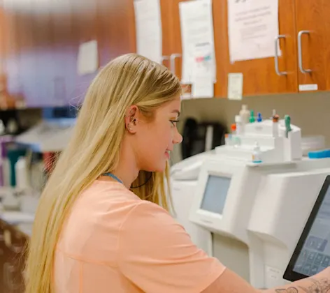 Coronado staff looking at a monitor. Coronado staff looking at a monitor.