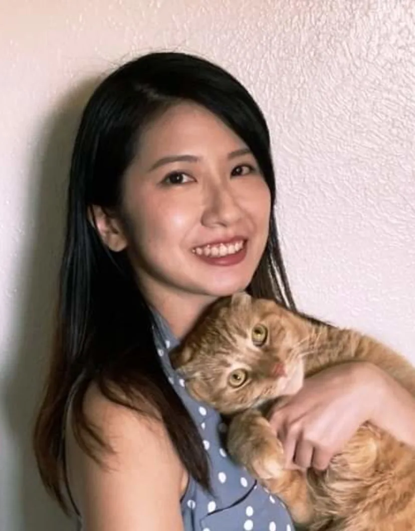 Dr. Yi-An Yang holding a cat
