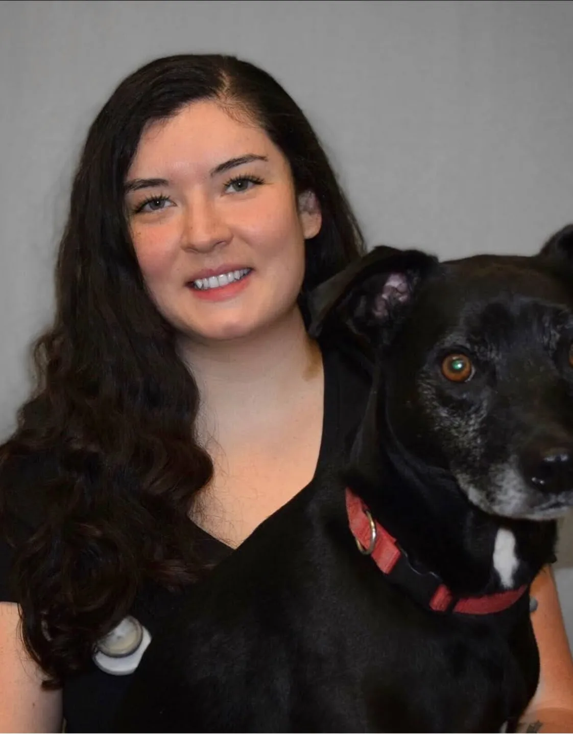 Melissa with a black dog Melissa with a black dog