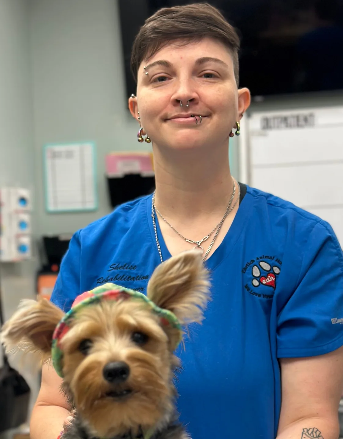 Shelise with an opossum on her shoulder Shelise with an opossum on her shoulder