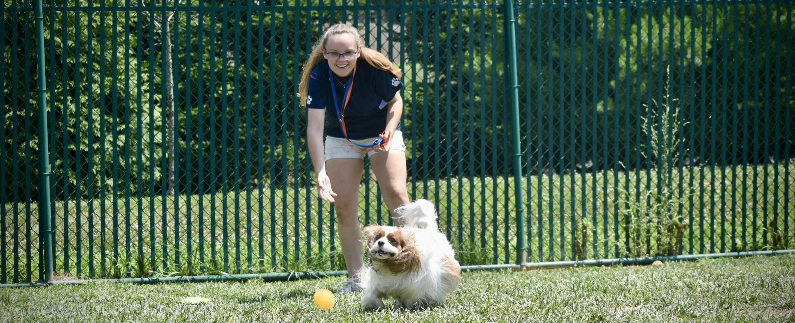 Person with dog outside