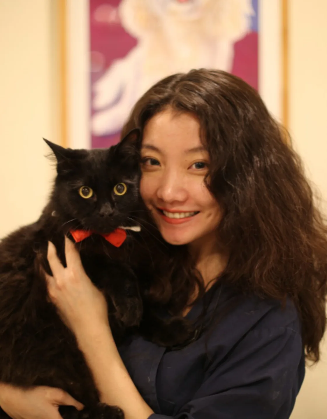 Rita holding black cat Rita holding black cat