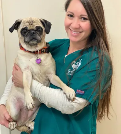 Greenbrier Veterinary Clinic Lindsay Delaney staff photo with her pug dog