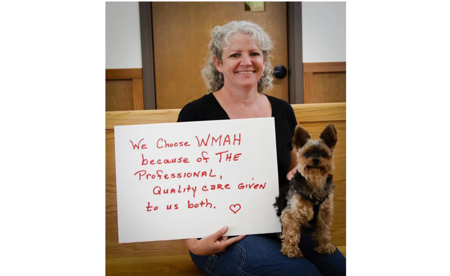 Client holding sign Client holding sign