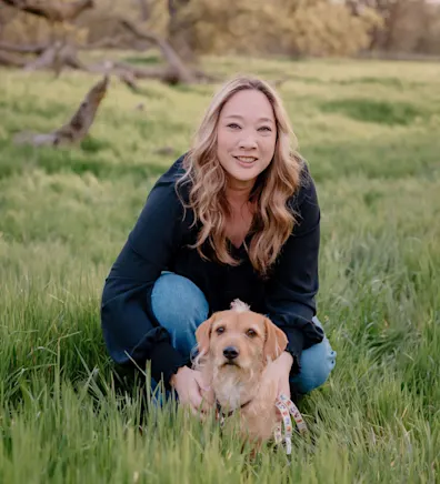 Terra and her dog in the grass Terra and her dog in the grass