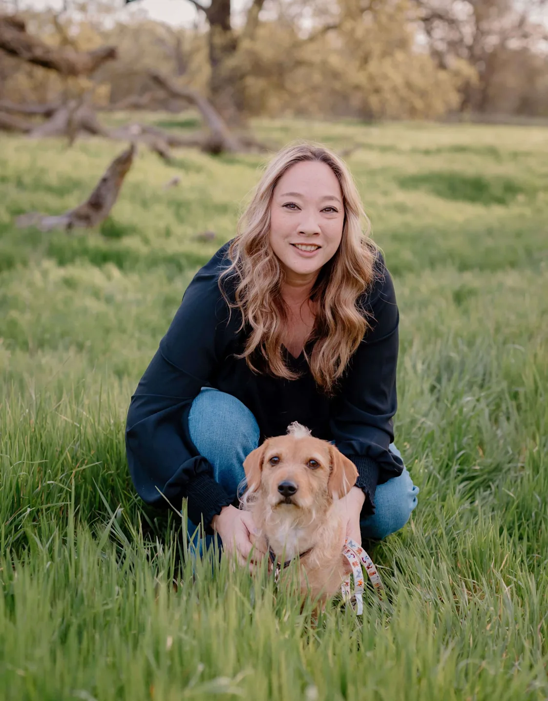 Terra and her dog in the grass Terra and her dog in the grass