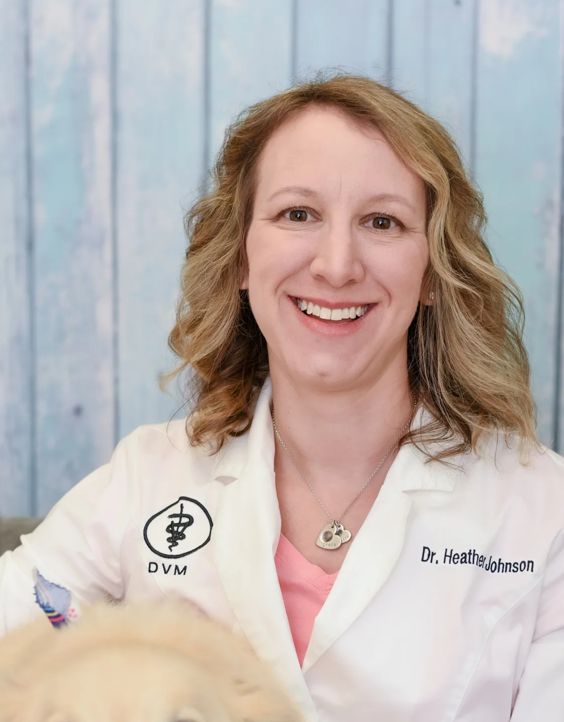 Dr. Heather Johnson WITH A DOG Dr. Heather Johnson WITH A DOG