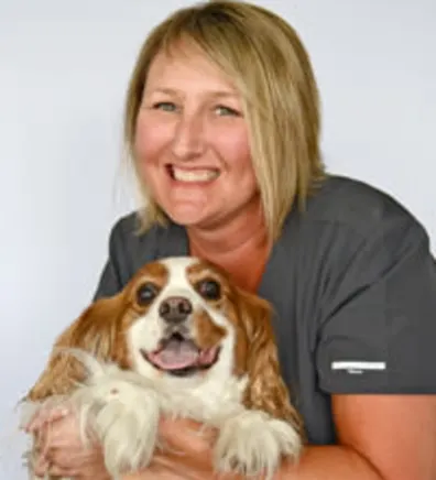 Jessica holding a dog Jessica holding a dog