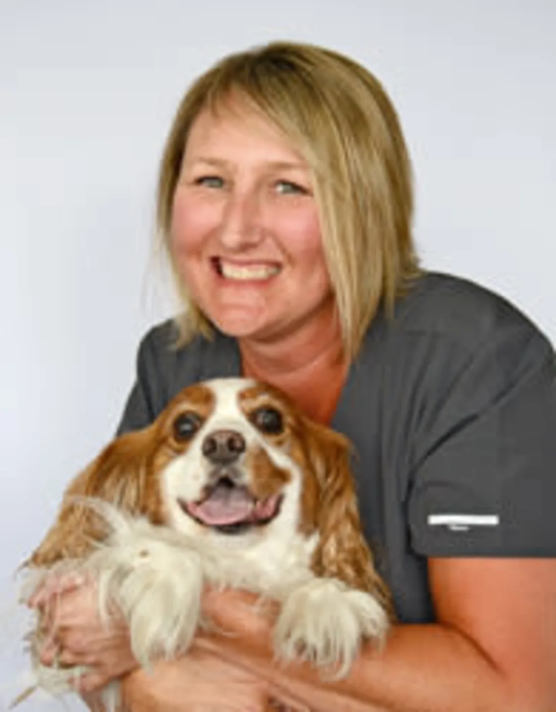 Jessica holding a dog Jessica holding a dog