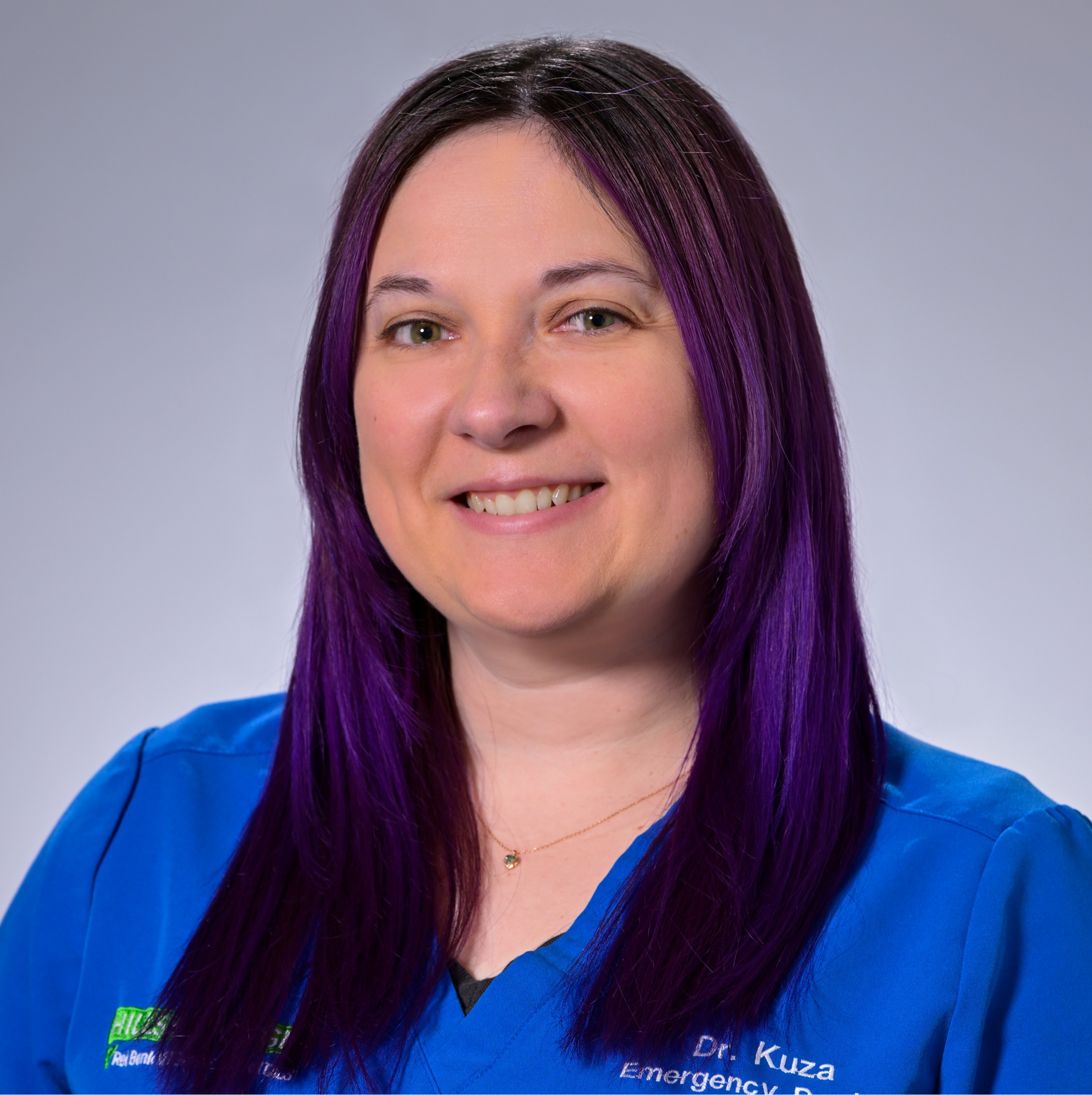 Agatha J. Kuza Smiling in front of the camera 