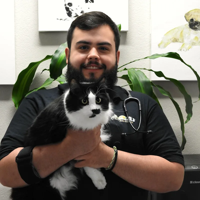 Phillip holding Roady the cat Phillip holding Roady the cat