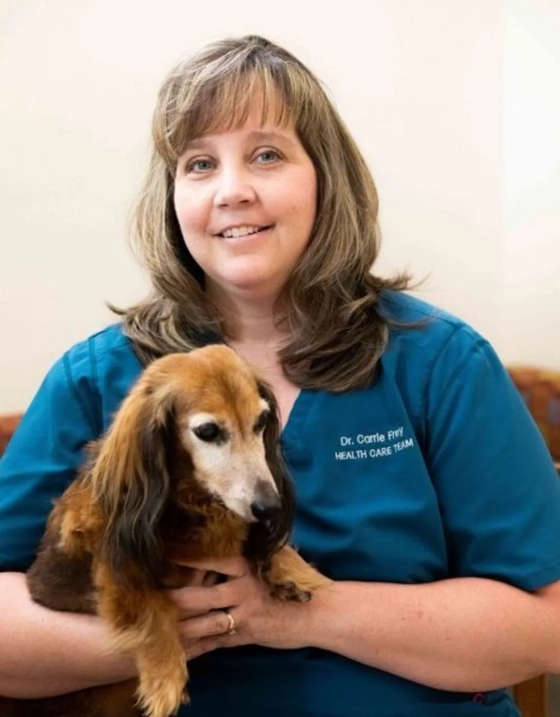 Dr. Carrie Frey with dog. Dr. Carrie Frey with dog.