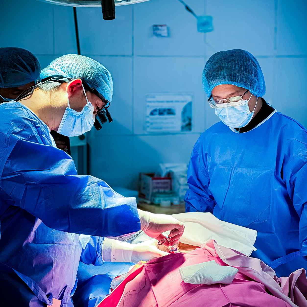 Surgery being performed on a patient