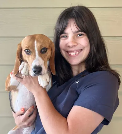 Emma Rice holding a beagle Emma Rice holding a beagle