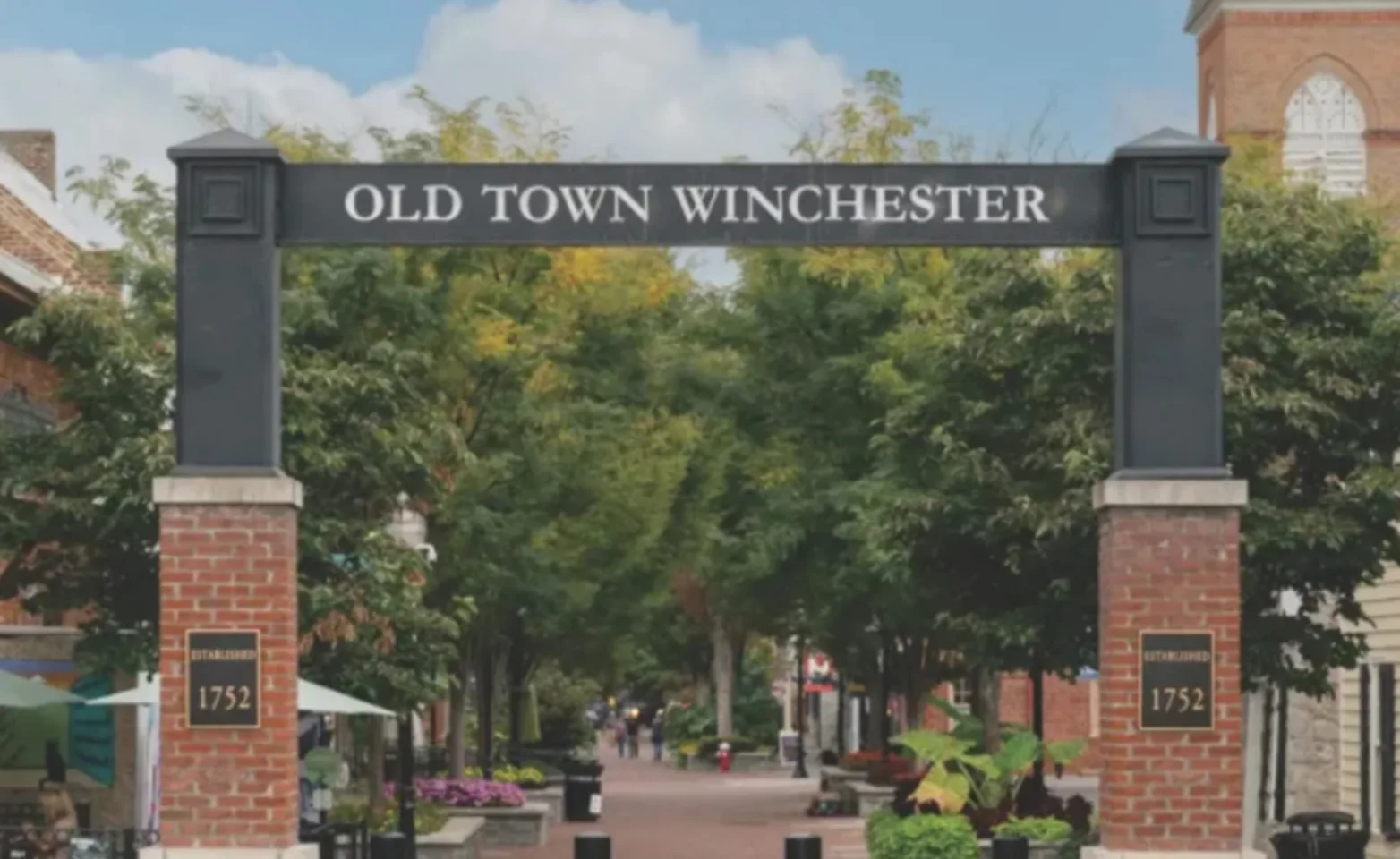Old Town Winchester sign on the gate entrance Old Town Winchester sign on the gate entrance