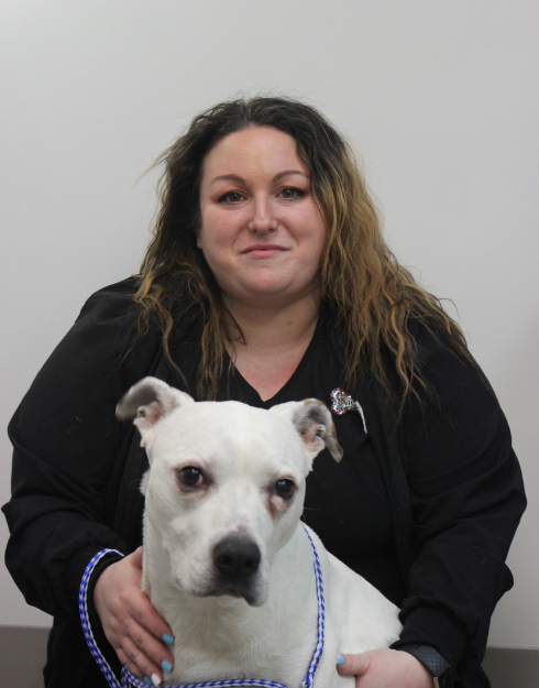Nicole New Haven Pet Hospital with a white dog and gray dog