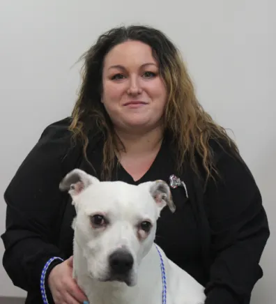 Nicole New Haven Pet Hospital with a white dog and gray dog