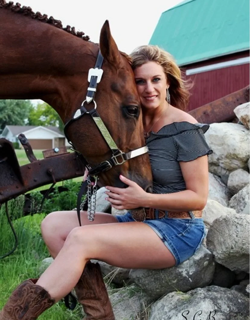 Tiffany from Midland Animal Clinic with a brown horse