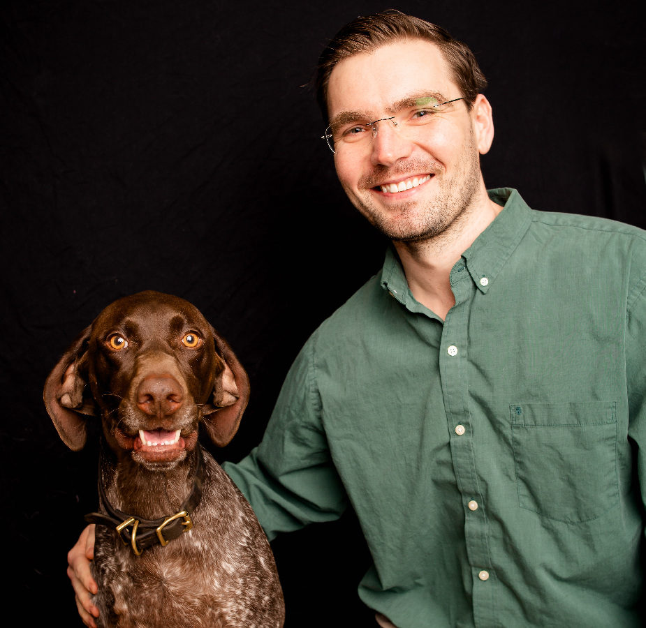 A Kindness Animal Hospital staff member with a dog