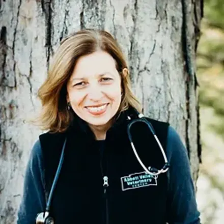 Dr. Joyce Gifford in front of a tree