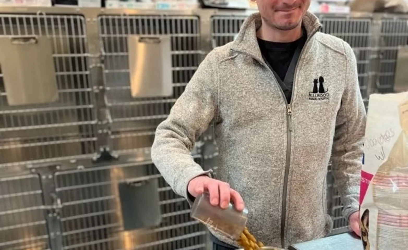 Staff serving kibble Staff serving kibble