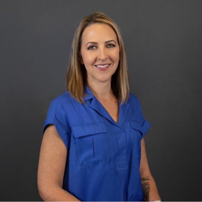 Vicky Brister holding 2 dogs