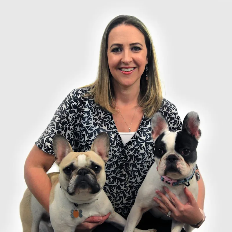 Vicky Brister holding 2 dogs Vicky Brister holding 2 dogs
