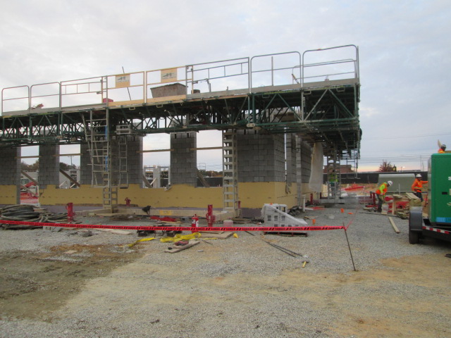 A corner view of VVC Short Pump's building being constructed