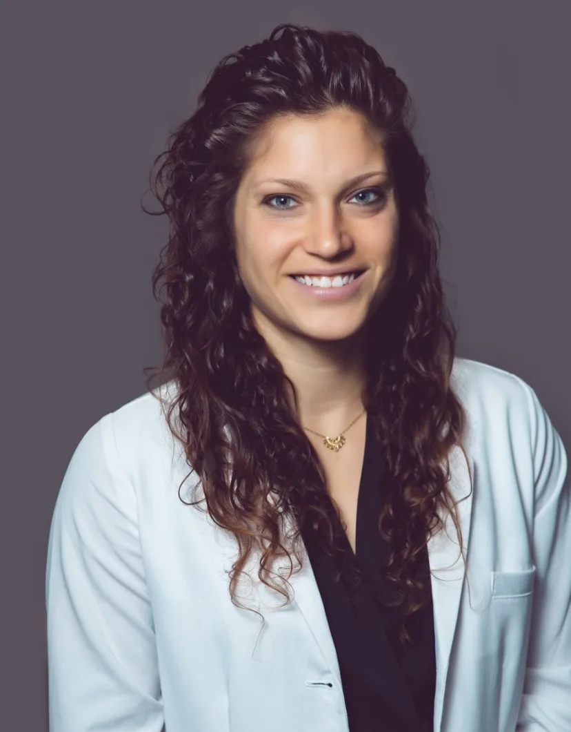 Teresa Statsny portrait and wearing a white coat