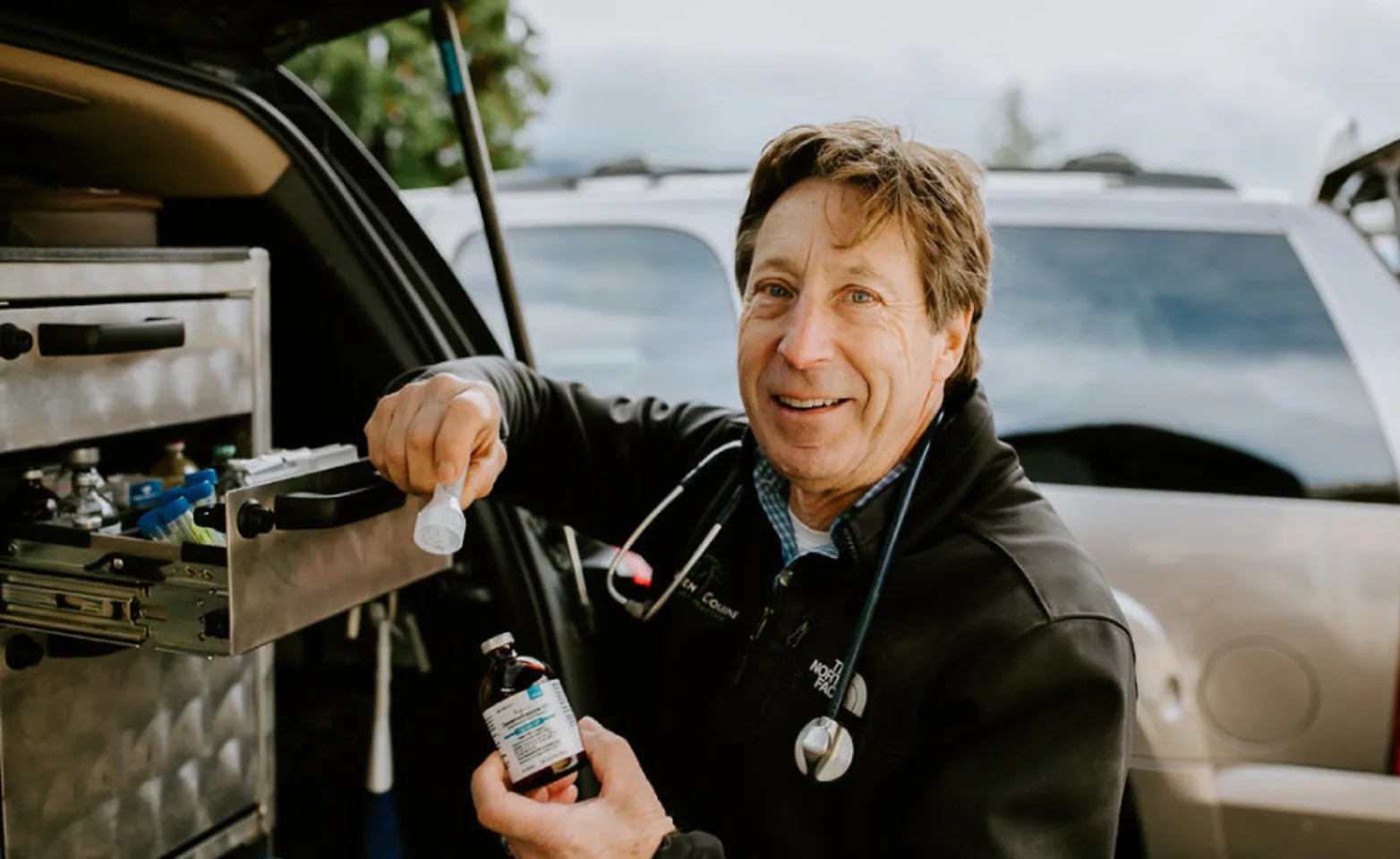 Doctor preparing deworming medication for a horse. Doctor preparing deworming medication for a horse.