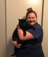 Caroline holding black cat